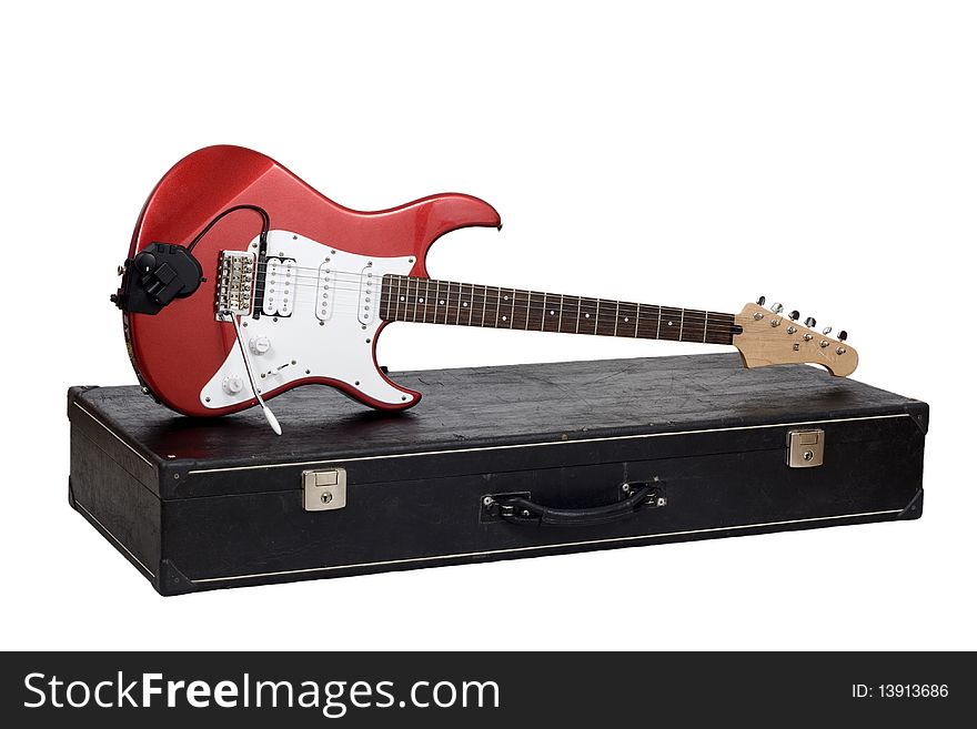 Red electric guitar isolated on white