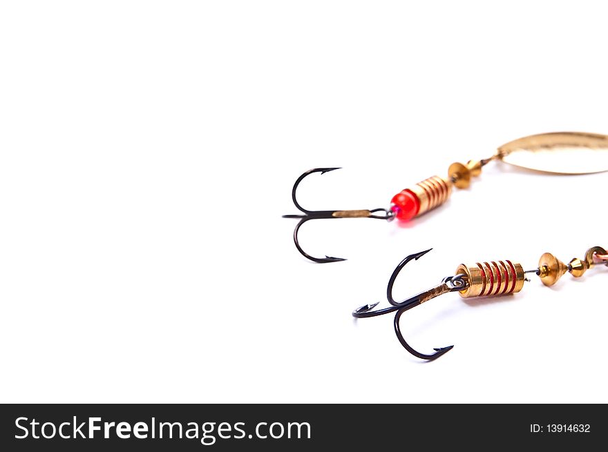 Two fishing hooks with clipping paths isolated on white. Two fishing hooks with clipping paths isolated on white