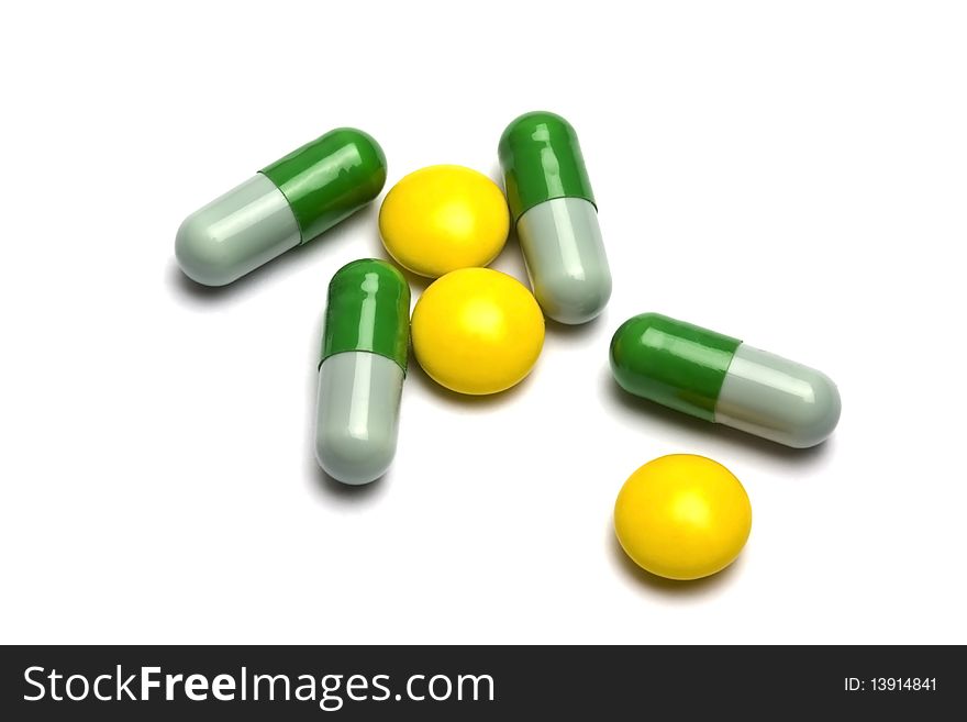 Some pills on white background