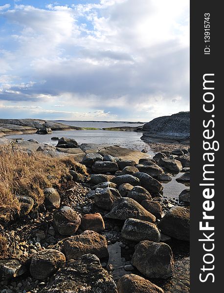 Wild Baltic sea coast with cloudy sky. Wild Baltic sea coast with cloudy sky