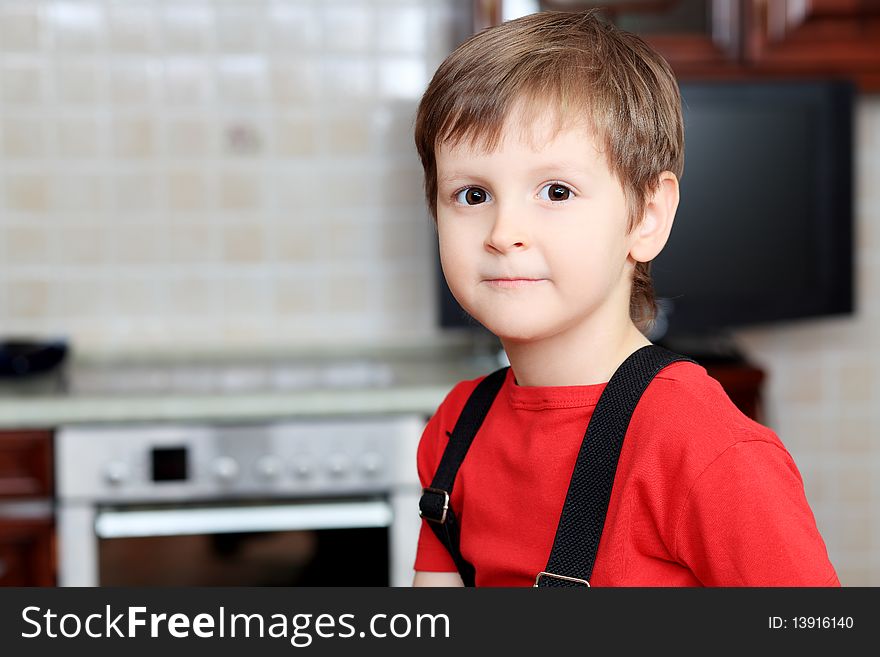 Boy at a kitchen