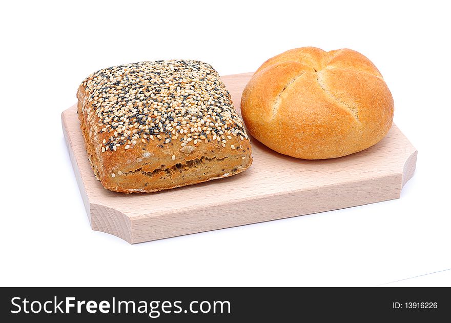 Two different types of bread isolated on a white background