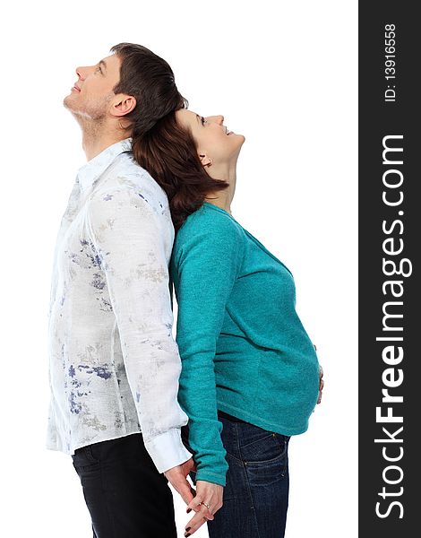 Portrait of a happy married couple. Isolated over white background.