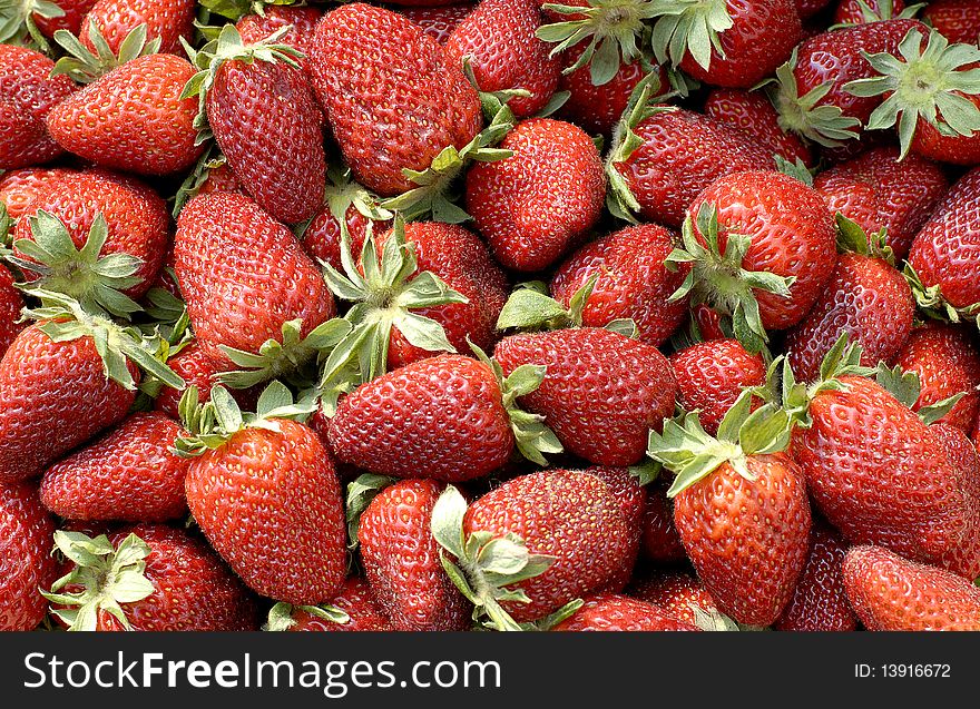 Red ripe strawberries selling on the market