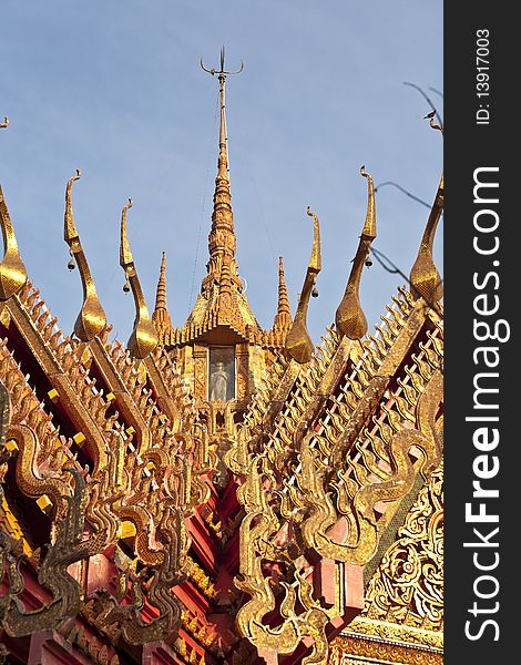 Cascade of decorations on Thai church roof. Cascade of decorations on Thai church roof