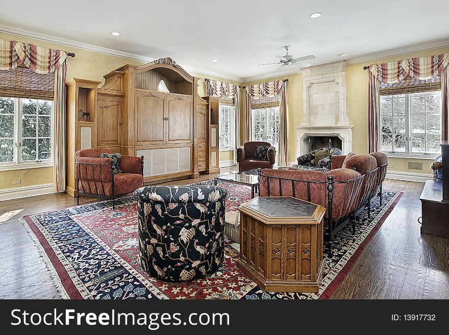 Family room in luxury home with stone fireplace. Family room in luxury home with stone fireplace