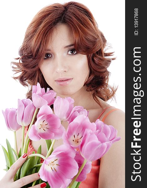 Beautiful woman with flowers isolatedon white