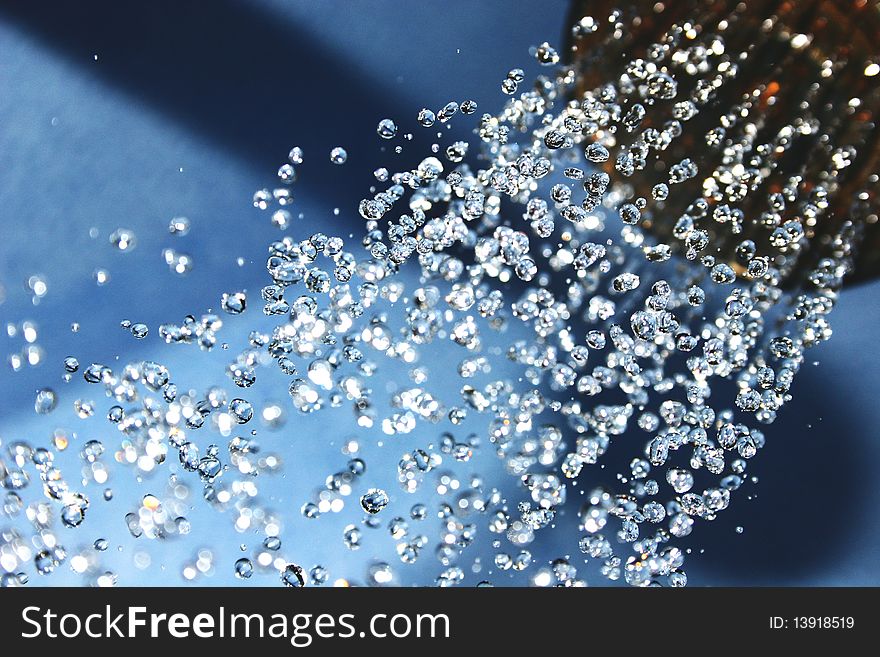 Shower. A water stream. Falling drops. Shower. A water stream. Falling drops