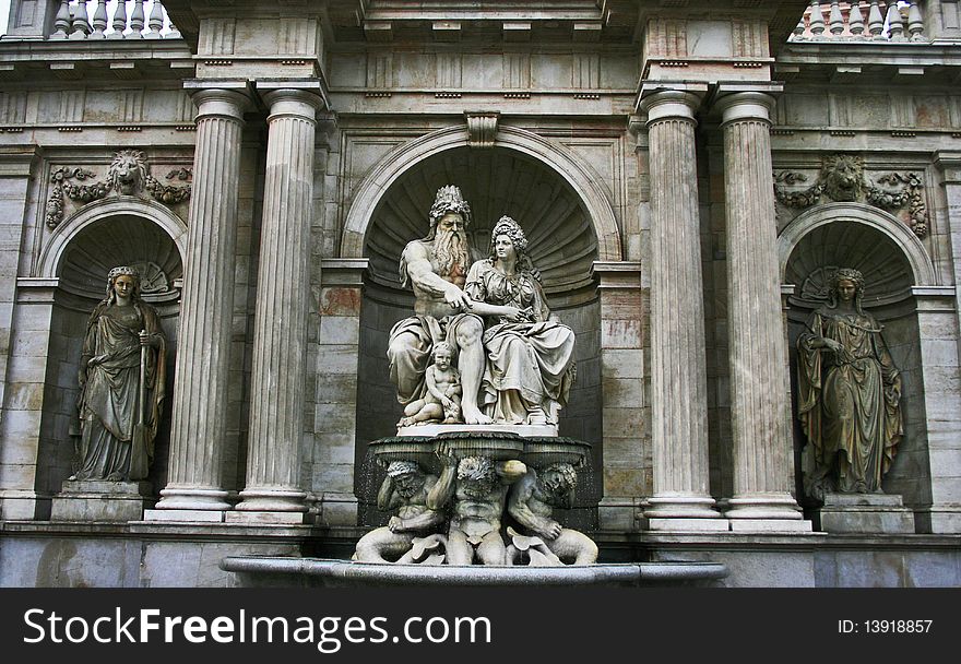 The impressive and grand imperial fountain decorating the entrance to the Hofburg imperial palace in Vienna Austria. Built in classic renaissance style the statue is an allegory of the Austrian rivers. The impressive and grand imperial fountain decorating the entrance to the Hofburg imperial palace in Vienna Austria. Built in classic renaissance style the statue is an allegory of the Austrian rivers.