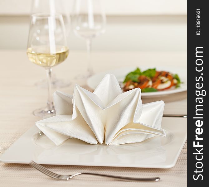 Served Place Setting with White Wine Glass. Served Place Setting with White Wine Glass