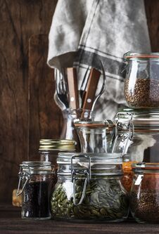Stocks Or Set Of Cereals, Pasta, Groats, Organic Legumes And Useful Seeds In Glass Jars. Vegan Source Of Protein And Energy Royalty Free Stock Images
