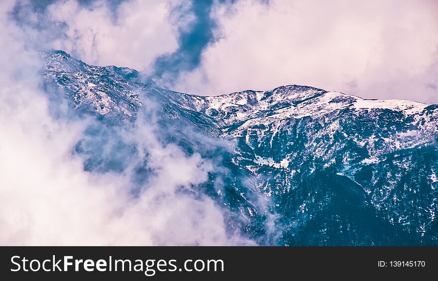 Kanchenjunga Mountain With Scattered Thick Clouds At Top. Beautiful Landscape Background Photography. Yumthang Valley, North