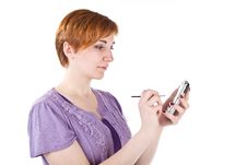 Young Woman With Palmtop Royalty Free Stock Photography