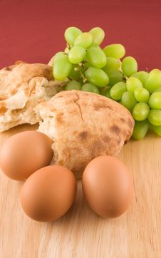 Fresh Bread With Eggs And Grapes Stock Photography Fresh Bread With Eggs And Grapes Stock Photography