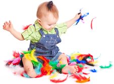 Little Boy Is Sitting On A Flow With Feathers Stock Image Little Boy Is Sitting On A Flow With Feathers Stock Image