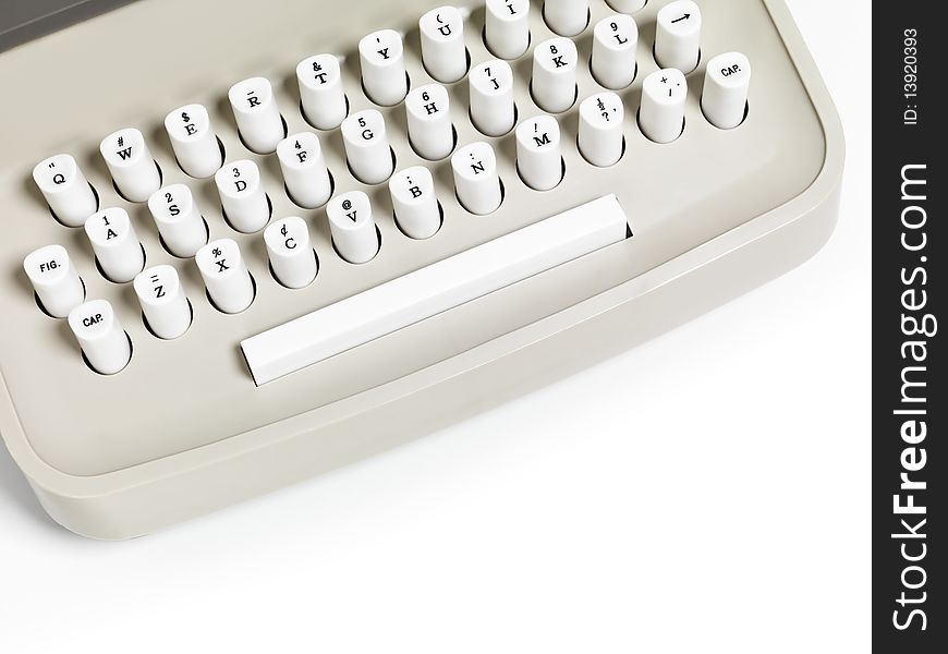 Closeup of a retro typewriter keyboard isolated on white background
