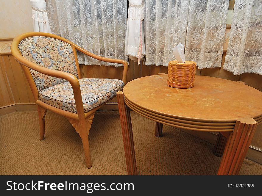 Tea table and chair in high class hotel room. Suitable for concepts such as travel, tourism, vacation and holiday. Tea table and chair in high class hotel room. Suitable for concepts such as travel, tourism, vacation and holiday.