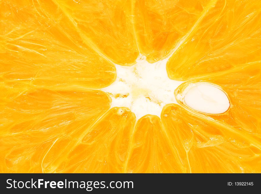 Pulp of an orange with a stone