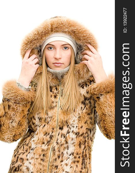 The Girl In A Fur Coat Isolated Over White