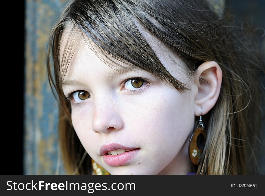 One child portrait with beautiful earrings. One child portrait with beautiful earrings