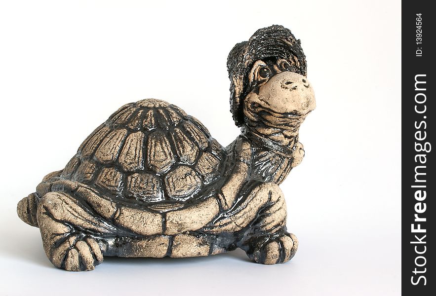 Souvenir comic image turtles (ceramics), isolated on white.