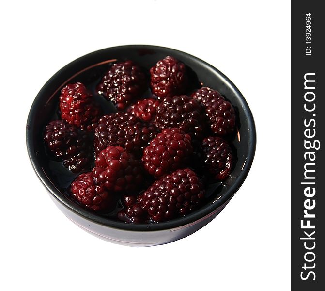 Bowl with fresh and tasty blackberries picked up from the forest. Bowl with fresh and tasty blackberries picked up from the forest