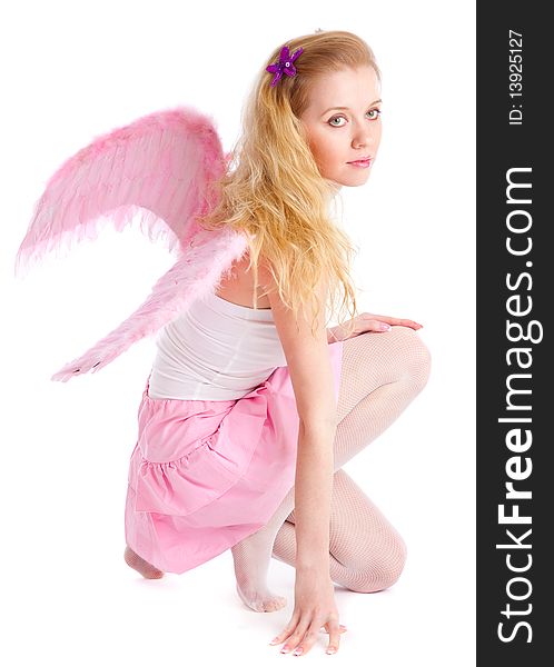 Young blond woman with wings. Isolated on white background. Young blond woman with wings. Isolated on white background