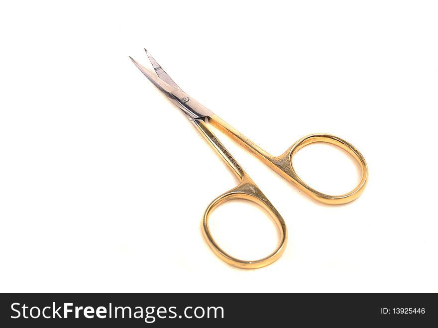 Close up and isolated shot of modern sharp scissors against white