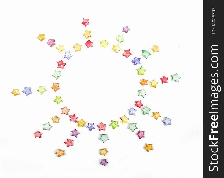 Color lucky stars origami sun on white background