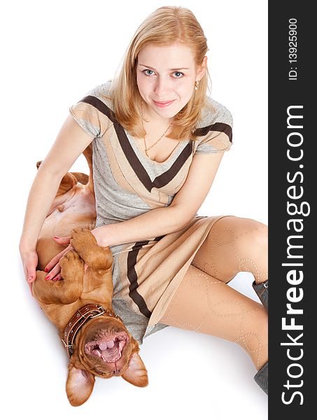 Young girl with puppy of Dogue de Bordeaux (French mastiff). Isolated on white background