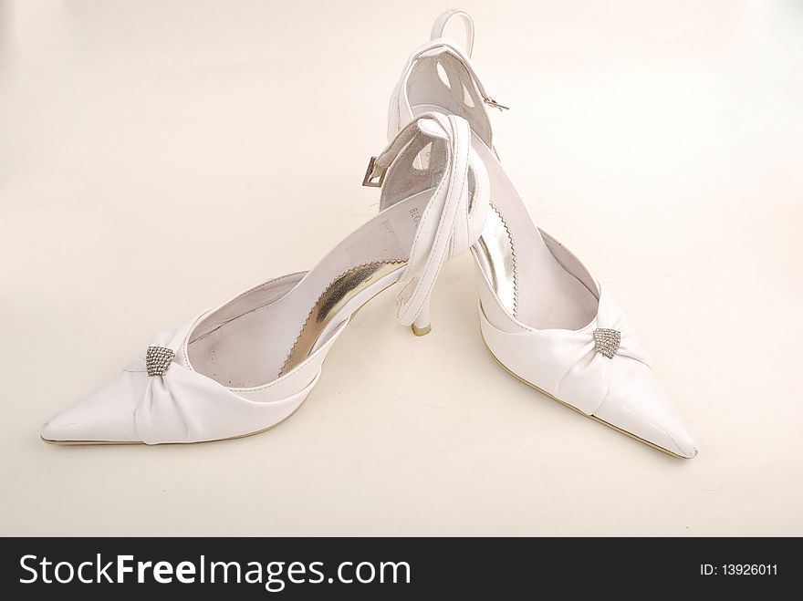 Celebratory female white shoes on a white background