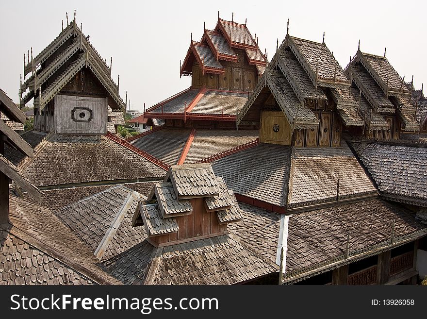 Wooden roof of thai ancient temple.
Generality in Thailand, any kind of art decorated in Buddhist church, temple pavilion, temple hall, monk's house etc. created with money donated by people to hire artist. They are public domain or treasure of Buddhism, no restrict in copy or use, no name of artist appear (but, if there is artist name, it only for tell who is the artist of work, not for copyright