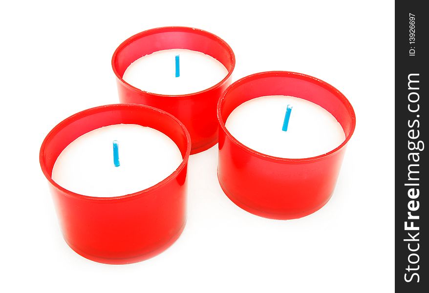 Three candles isolated on white