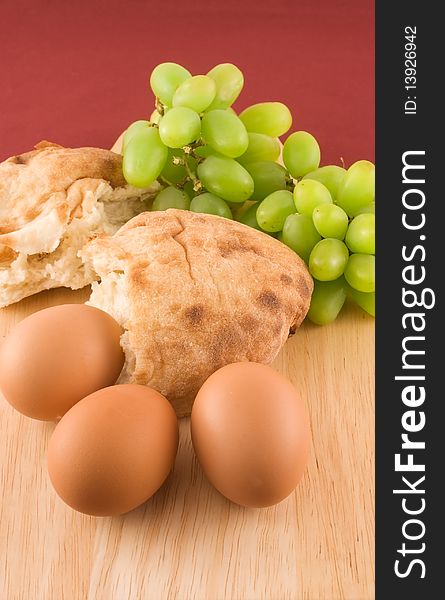 Fresh Bread With Eggs  And Grapes