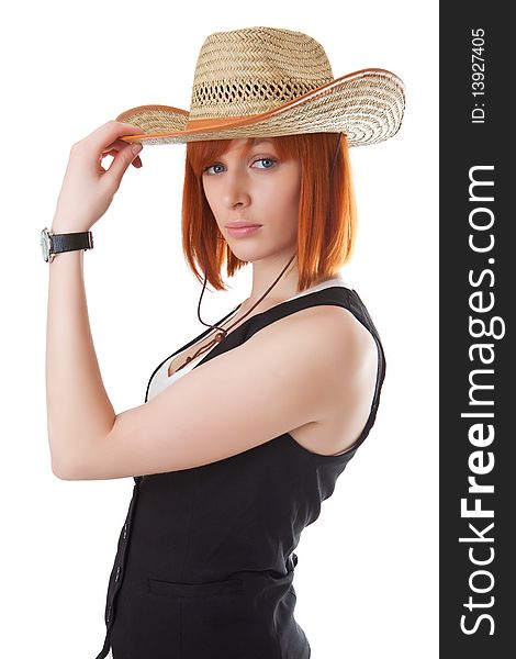 Beautiful red girl in a cowboy's hat. Beautiful red girl in a cowboy's hat