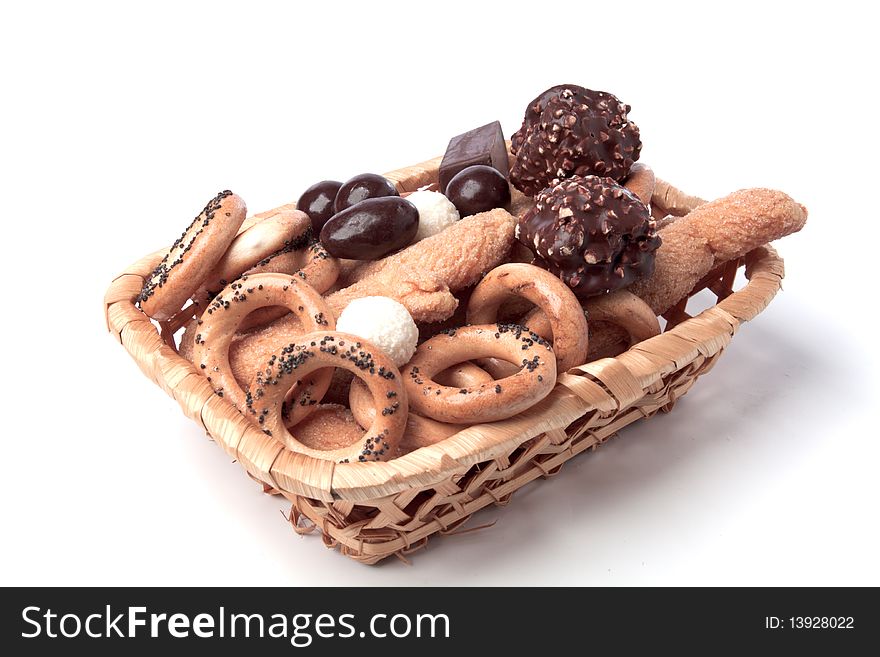 Buns in a wicker basket on a white background