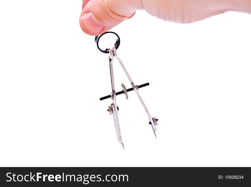 Graphics compass for technical drawing in man hand. Isolated on white. Graphics compass for technical drawing in man hand. Isolated on white