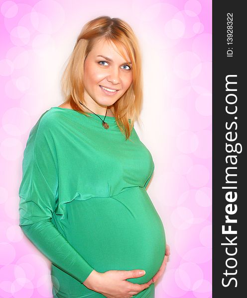 Pregnant wom on a pink background. Pregnant wom on a pink background