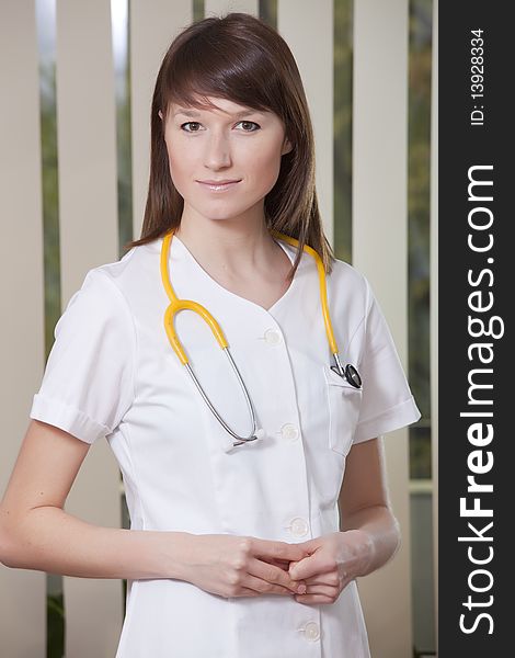 Portrait of female nurse in medical office