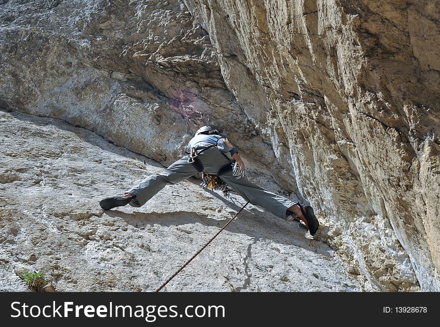 Rock climber on a difficult route