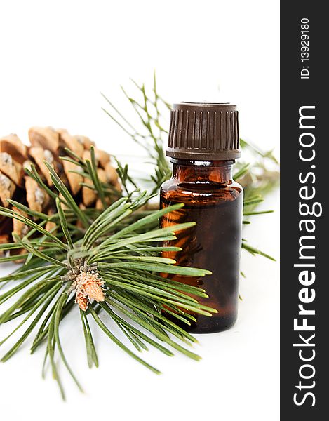 Bottle of fir tree oil over white