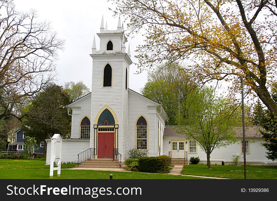 Historic church in small village of Michigan in spring time