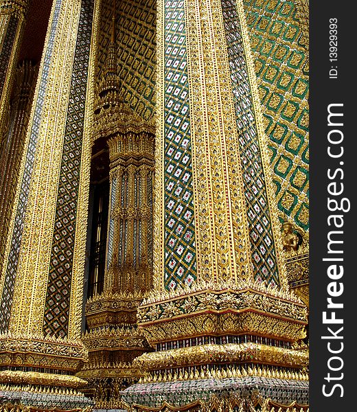 Golden pillars in a buddhist temple, Bangkok, Thailand. Golden pillars in a buddhist temple, Bangkok, Thailand