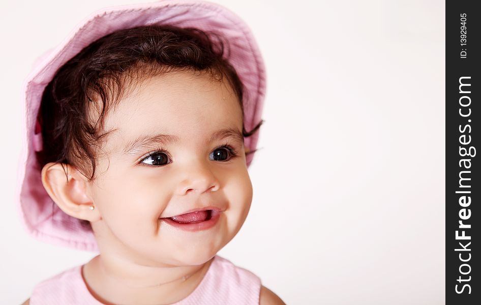 Baby smiling over white background. Pink dress. Baby smiling over white background. Pink dress