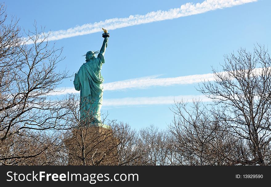 Statue of Liberty seen from the rear, New-york City, NY, USA. Statue of Liberty seen from the rear, New-york City, NY, USA