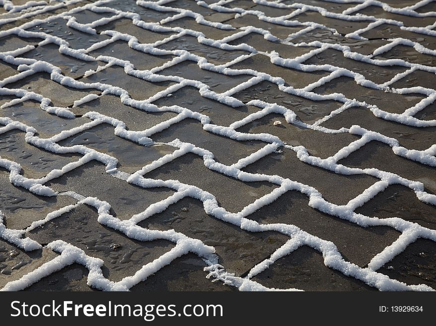 Snow And Ice On Paving Flag