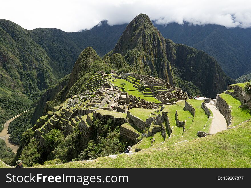 Machu Picchu Ruins overlooking Peru Mountain Range