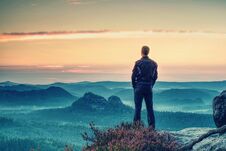 Tourist Traveler Standing On Cliff Of Mountain Stock Photography Tourist Traveler Standing On Cliff Of Mountain Stock Photography