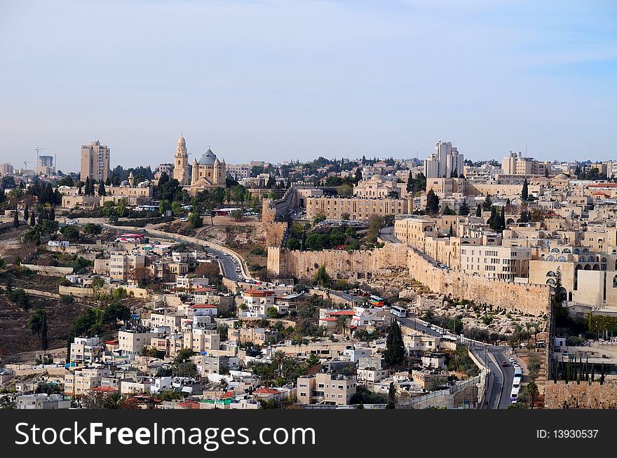 Jerusalem mountain range Moriah with antique fortress and church the Apostle Peter and singing the cock