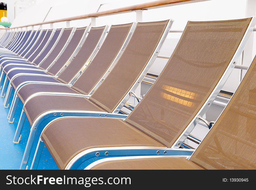 Deck chairs on the cruise ship deck. Deck chairs on the cruise ship deck.